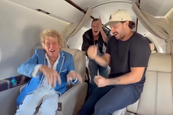 Rod Stewart parties on private jet on way to watch Scotland in World Cup after cancelling show