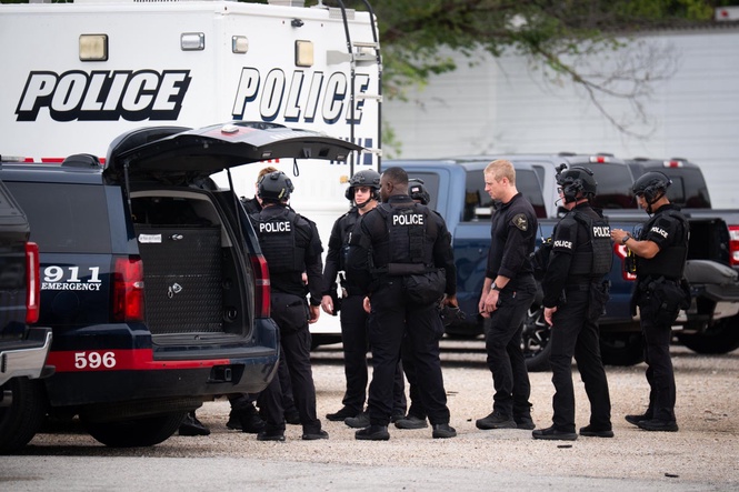 Armed police and Swat team respond to incident close to England World Cup stadium