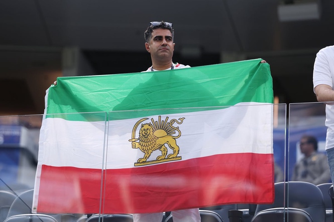 Protests erupt outside Iran’s World Cup opener after court upholds flag ban