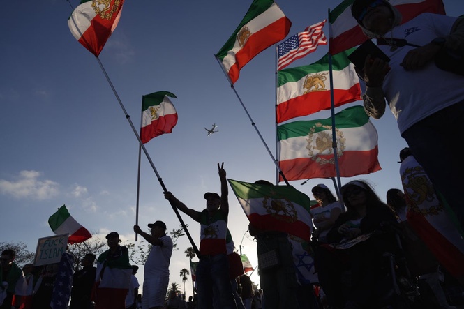Iranian Americans protest for change outside Iran's World Cup match, in photos