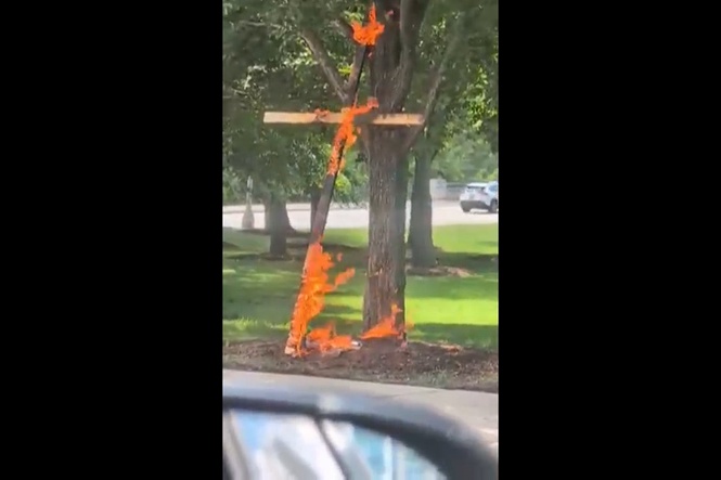 A person is in custody in a Chicago cross burning investigation, police say