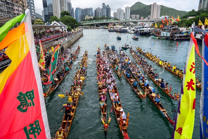 Competitors take part in boat races to mark the Dragon Boat Festival ...