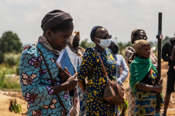 Mourners bury a 6-month-old Ebola victim, marking third orphanage death as Congo outbreak spreads
