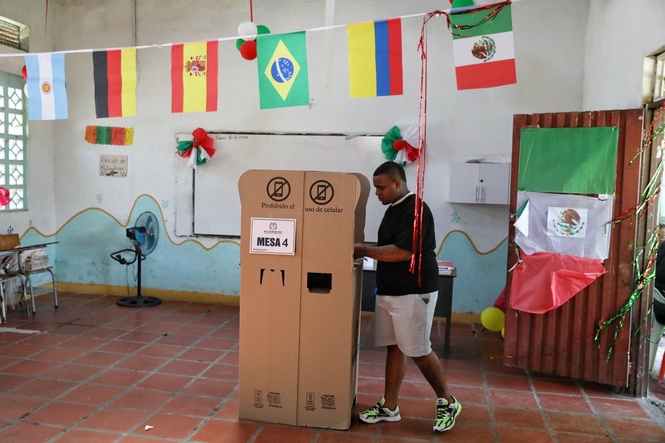 Colombians choose between an outsider and a progressive in a presidential runoff election, in photos