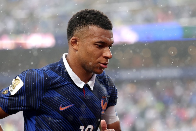 France vs Iraq LIVE: Kylian Mbappe goal gives way to weather delay with restart time edging closer