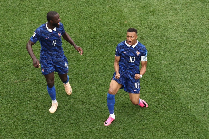 Mbappe chases Messi record as France overcome two-hour storm delay