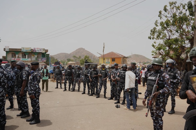 Armed group in Nigeria kills at least 20 people and exchanges gunfire with police