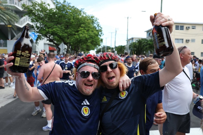 Scotland fans bring World Cup party to Miami as thousands march to local baseball match