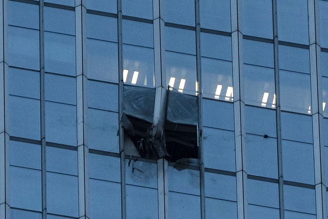 Small plane crash at Beijing high-rise kills the pilot and injures 13, authorities say