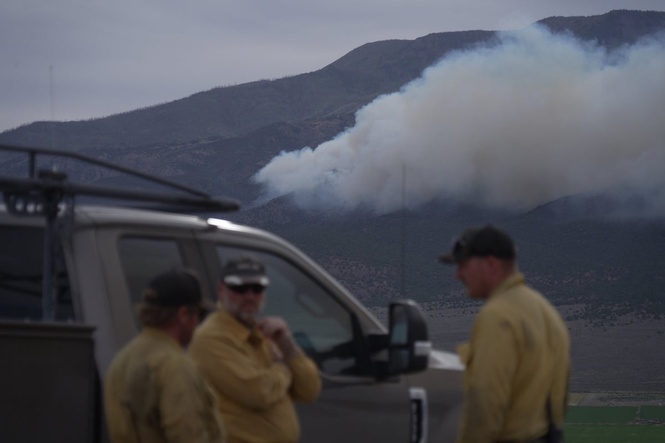 Fast-moving wildfire spreads through western US as restrictions put in place