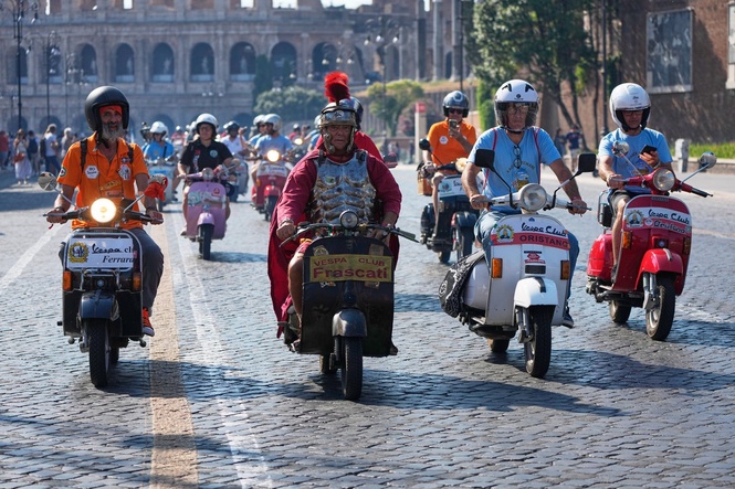 More than 15,000 Vespas from across the world swarm Rome as iconic scooter celebrates anniversary
