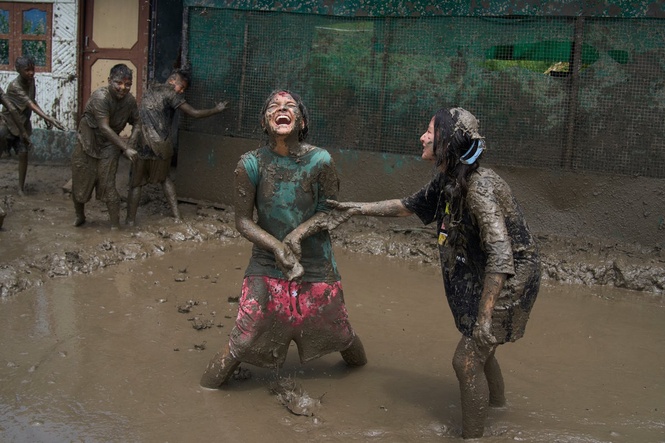 Photo show Paddy Day, the festival marking the start of the rice planting season in Nepal