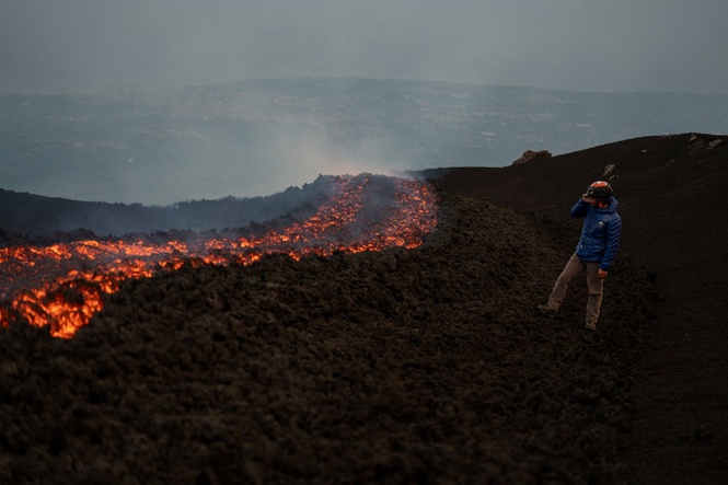 Mount Etna spews bright orange lava as Europe’s most active volcano erupts again