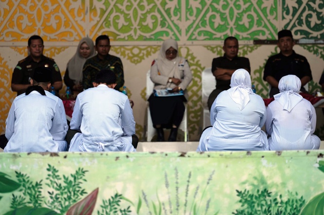 Couple caned for kissing on TikTok in Indonesia's conservative Aceh province