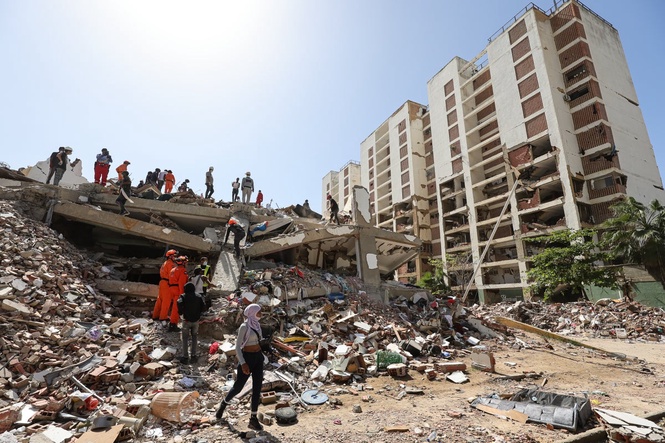 Woman survived Venezuela earthquake by crawling through rubble hours after being deported by US