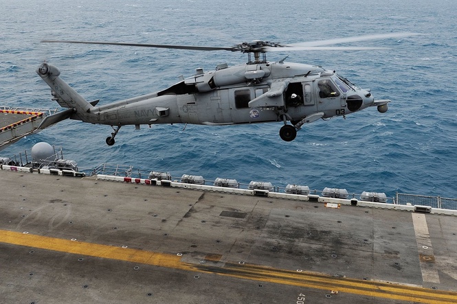 Navy searching for missing crew member after US helicopter has ‘emergency water landing’
