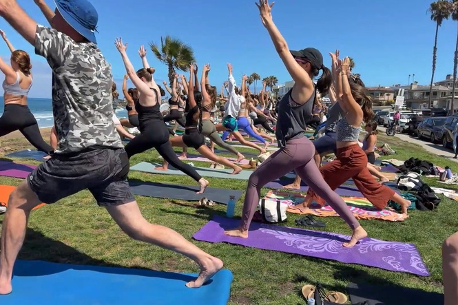 San Diego banned yoga classes at beaches and parks. An instructor known as ‘Namasteve’ is taking them to the mat