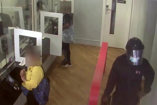 Ex-security guard in old uniform fools bank staff into handing over £117,000 cash