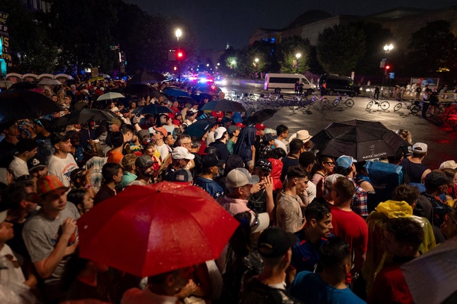 Anger and confusion as Trump keeps July 4 MAGA crowd waiting in rain for more than an hour
