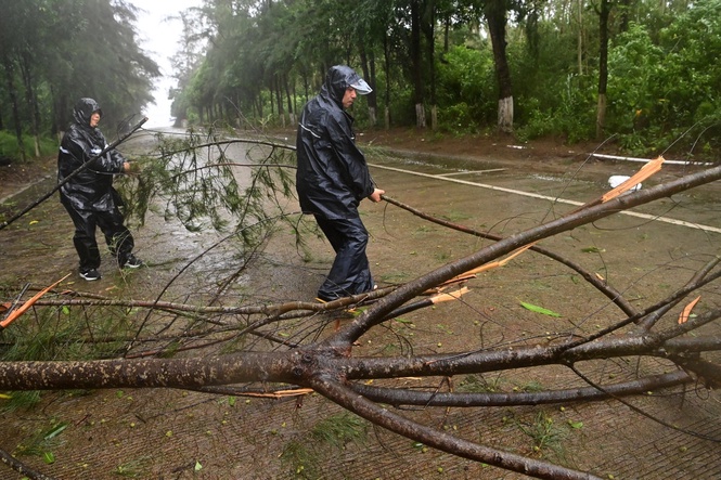 Heavy rains leave 5 dead in China's north while Tropical Storm Maysak hits the south and Vietnam
