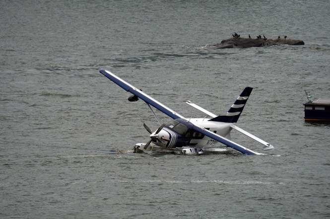 Eight people rescued after seaplane comes down in East River off New York City