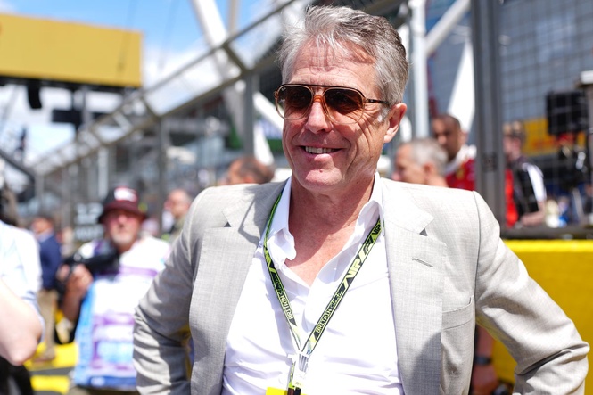 Hugh Grant caught in awkward F1 grid walk chat over Netflix series