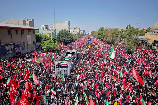 Huge crowds line streets of Tehran for Khamenei funeral procession as mourners chant for revenge