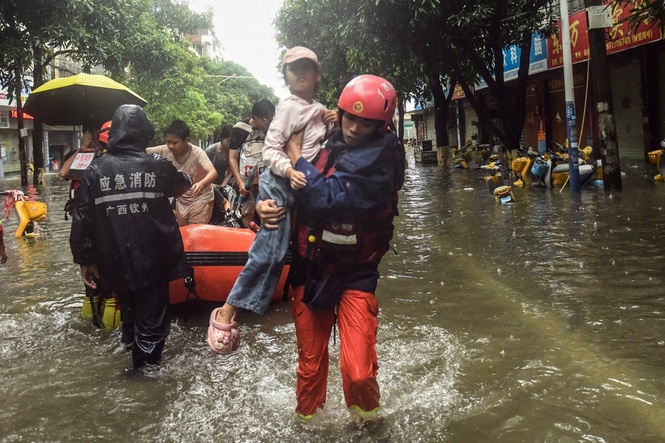 A southern Chinese region reels from floods and destruction from remnants of tropical storm