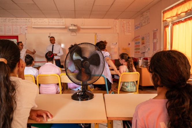 School absences in England reached nearly 20% during June heatwave amid rare red heat warning