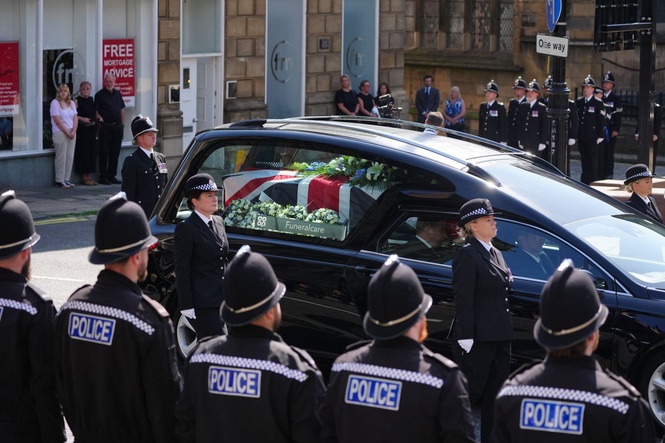 Police form guard of honour at funeral of young officer fatally injured on duty