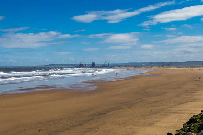 Two men die after going into sea to save two children at UK beach