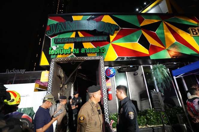 At least 27 killed after fire broke out at Bangkok pub, leaving dozens of others injured