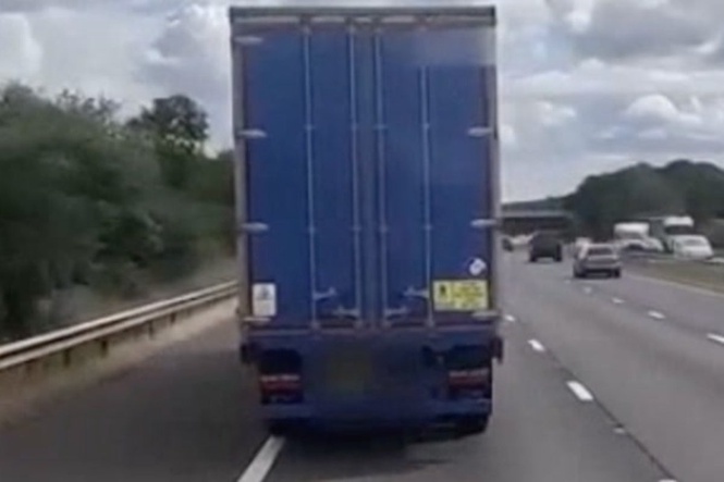 Lorry driver asleep at wheel swerves across busy motorway
