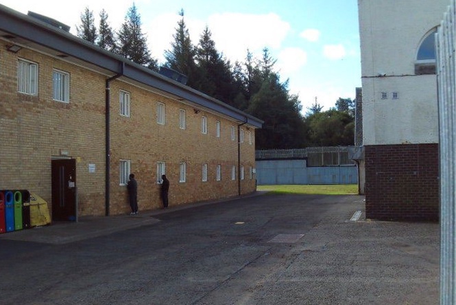 Male migrants detained at immigration centre caught looking through women’s bedrooms windows, report finds