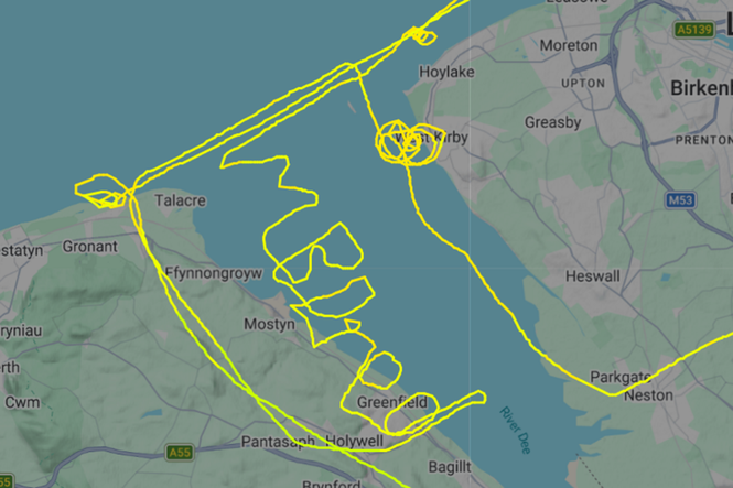 Pilot traces seven-letter phrase across sky during test flight