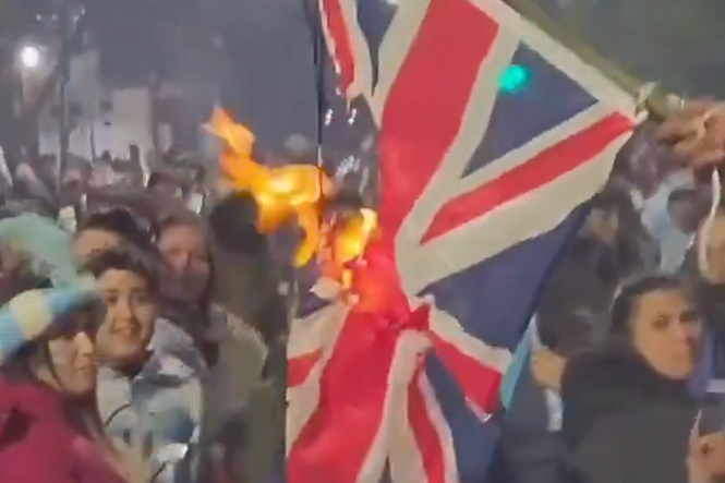 Union flag set on fire by Argentina fans ahead of England World Cup semi-final
