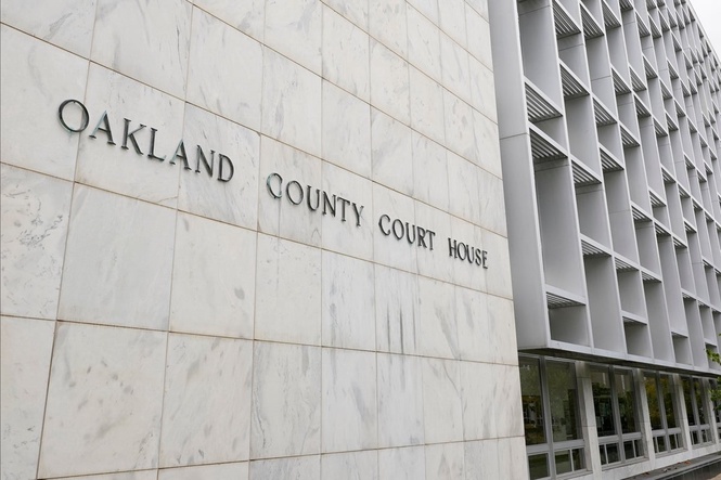 Michigan woman pleads no contest to abuse after 3 kids are found living alone for years