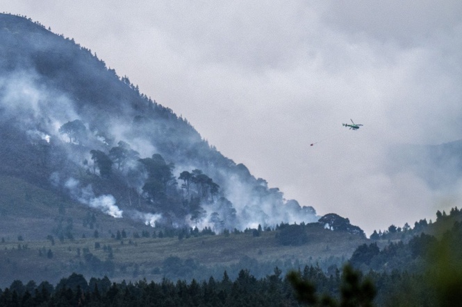 Helicopter deployed as firefighters spend third day tackling Cairngorms wildfire