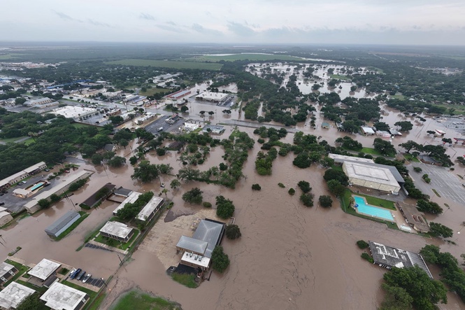 At least three dead and hundreds rescued after catastrophic flooding pounded Texas