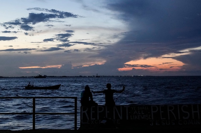 A ferry carrying 116 people capsizes off Guyana, with 53 rescued as search continues