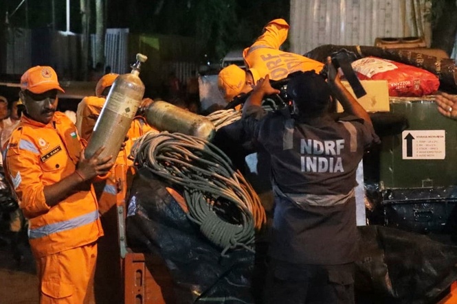 Death toll from India tunnel blast rises to 20 as rescuers try to reach five workers still trapped