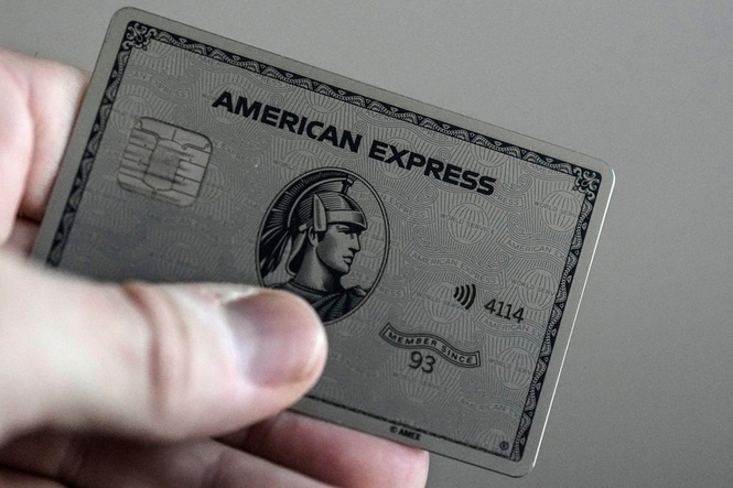 American Express reports a boost in profits driven by new customers and higher spending