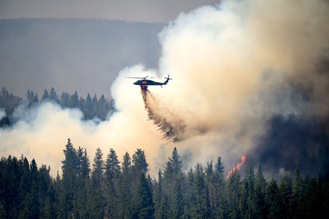 Oregon firefighters brace for windy and hot weather as they battle dozens of blazes