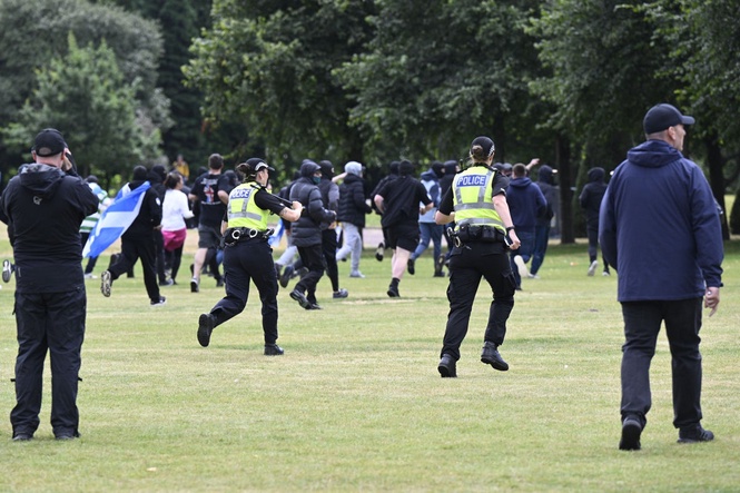 Police vow to catch violent offenders during Glasgow migration protest
