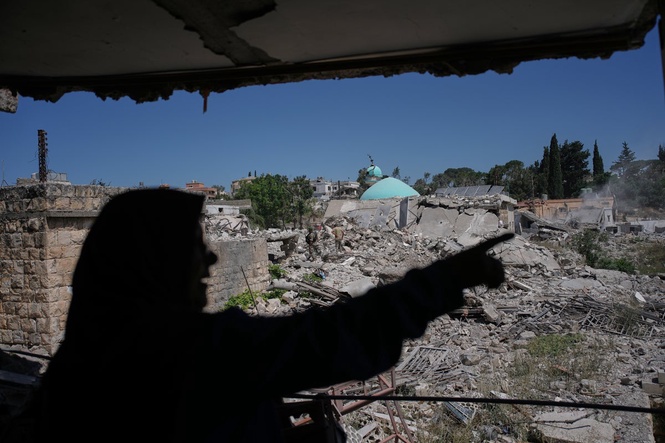 Residents return to a southern Lebanese village after a U.S.-brokered agreement, in photos
