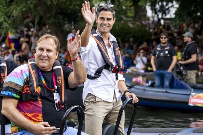 Openly gay Dutch prime minister Rob Jetten sails in boat during Amsterdam Pride parade