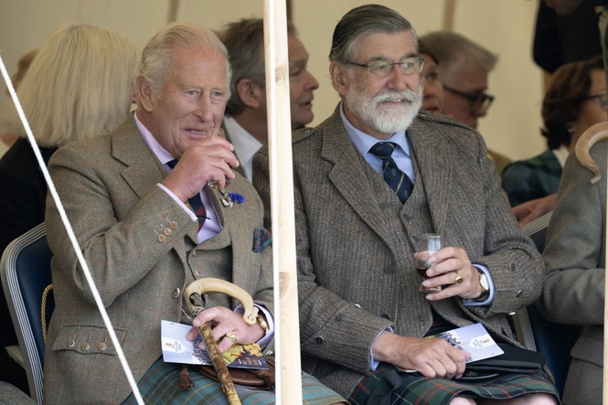 King enjoys a dram as he attends Mey Highland Games