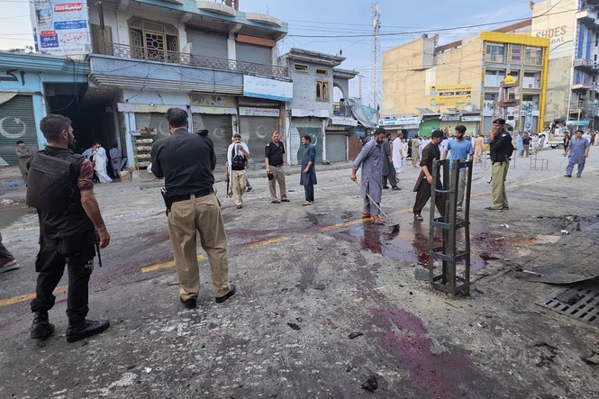 A suicide bomber strikes an anti-militant rally in northwestern Pakistan, killing at least 14