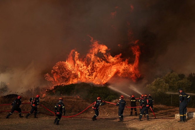 Thousands evacuated in Greece as wildfires burn for a fifth day