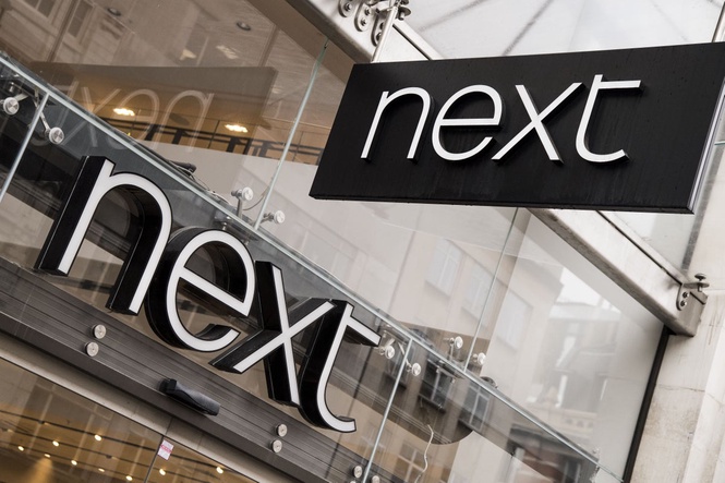 Next lifts profit outlook again after overseas and summer sales surge